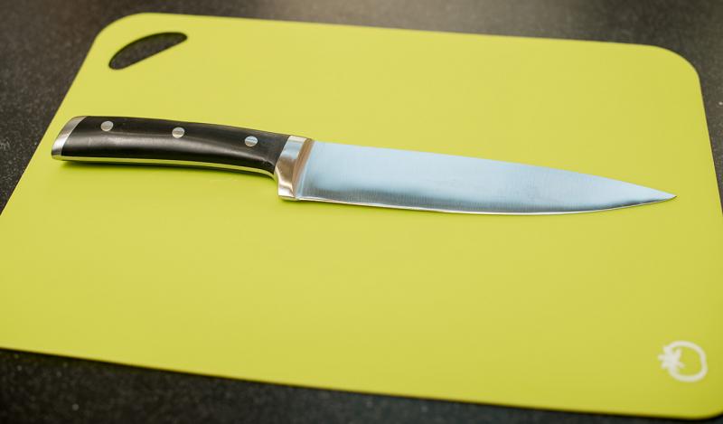 chef knife on cutting board