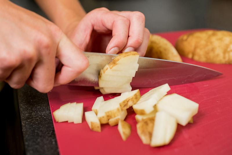 Chopping a potato